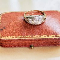 14K gold ring featuring old European-cut and transitional diamonds