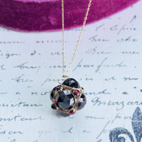 14k gold garnet orb pendant necklace with clustered garnet stones