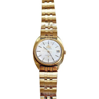 Vintage Omega Constellation automatic chronometer wristwatch in 14k gold on bracelet, front dial view.