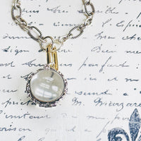 Antique Pools of light Rock Crystal necklace on a sterling silver textured paperclip chain