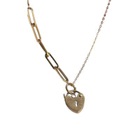 Full necklace laid flat showcasing chain detail and heart pendant