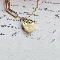 Image showing full english hallmarks on the back of the heart padlock