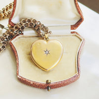 Antique 10k gold heart locket with diamond center, front detail showing vintage patina and craftsmanship, hipV Modern Vintage Jewelry