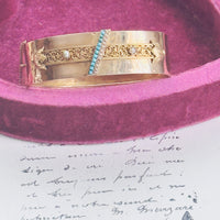 Antique Victorian gold bangle with turquoise inlay and seed pearls