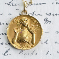 18K gold round locket