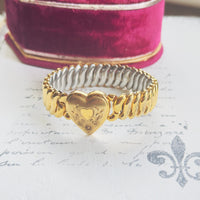 Bigney sweetheart expansion bracelet in gold filled with Florentine texture and engraved heart motif, mid-century American jewelry