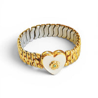 Co-Star expansion band bracelet with mother-of-pearl heart and flower setting