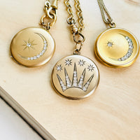 Collection of antique celestial lockets featuring Edwardian shooting star and crescent moon motifs in gold-filled finishes.