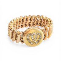 D.F. Briggs gold filled bracelet with round locket and clear paste stones