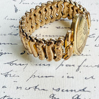 Side view of ornate expansion links on Pitman & Keeler sweetheart bracelet.