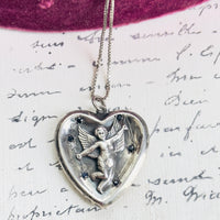 Sterling Silver Cupid Starburst Pendant Necklace