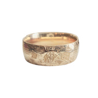 Vintage gold-filled wide hinged bangle bracelet with engraved monograms on both sides.