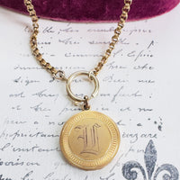 shop our collection of antique Lockets