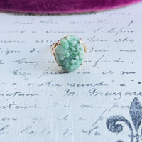 Hand-carved jadeite ring in 14k yellow gold openwork mounting