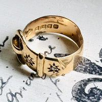 Interior view of an original 1916 English 18K gold buckle ring showing full London hallmarks and antique craftsmanship.