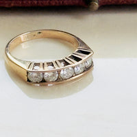 Stackable vintage diamond band in 14K rose gold with geometric stepped shoulders