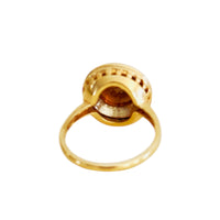 Reverse image of garnet ring