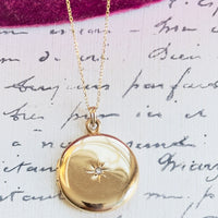 Vintage 14k gold locket necklace with starburst design