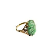 Vintage 14k gold ring with carved green jadeite stone and filigree setting