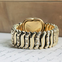 Vintage Jewel Guild gold filled sweetheart bracelet with pink enamel florals and scroll-engraved expansion band, hipV Modern Vintage Jewelry