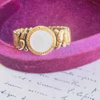 Vintage Phoenix sweetheart bracelet showing round mother of pearl detail and gold filled finish