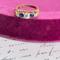 Vintage five-stone band with alternating diamonds and sapphires in 18k gold