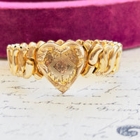 Vintage gold filled sweetheart bracelet by Speidel showing heart detail and expansion links