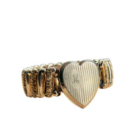 Vintage gold sweetheart bracelet with opening heart locket center, hand-engraved H monogram in oval cartouche, ornate expansion band