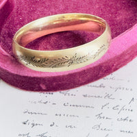 hipV gold-filled etched bracelet featuring soft Florentine texture and front engraving.