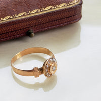 pearl and diamond ring with horse head hallmark on vintage box