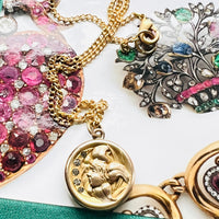 Vintage Cameo Locket featuring a image of a side profile women