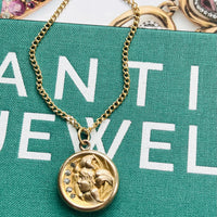 Antique Keepsake Locket featuring side profile lady