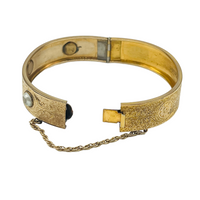 cuff bangle in gold.