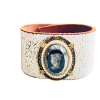 White Leather Cuff Bracelet featuring a vintage side profile cameo image of a women surrounded with flowers and pearls