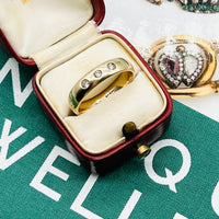 Vintage Gold Trilogy Diamond Band. Featuring 3 round diamonds on a 15ct gold band.