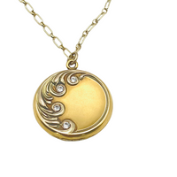 Art nouveau repousse antique gold-fill photo locket with 4 rhinestones.