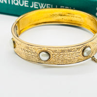 Vintage Gold Filled Bracelet featuring 3 round pearls .