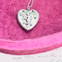 Sterling Silver Cupid Starburst Pendant Necklace