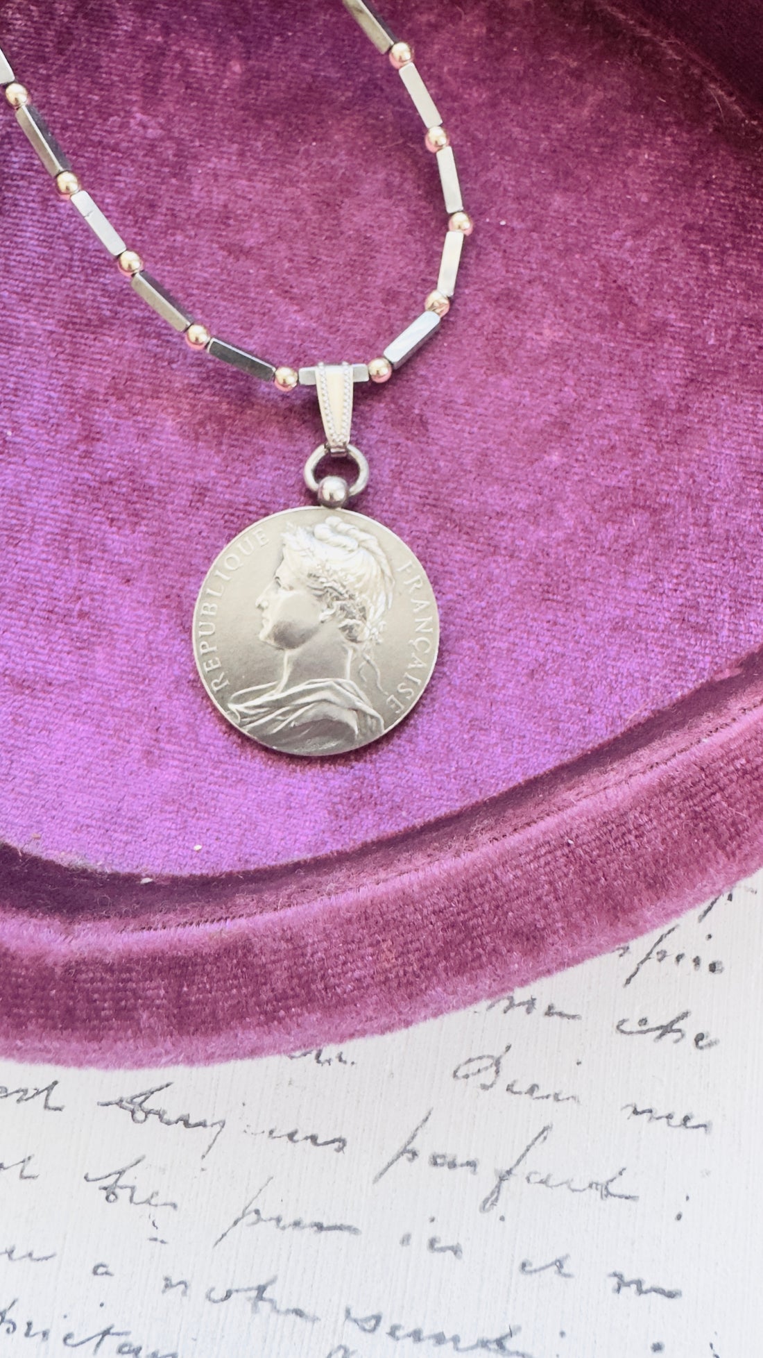 Close-up of A. Borrel signed French coin pendant in sterling silver