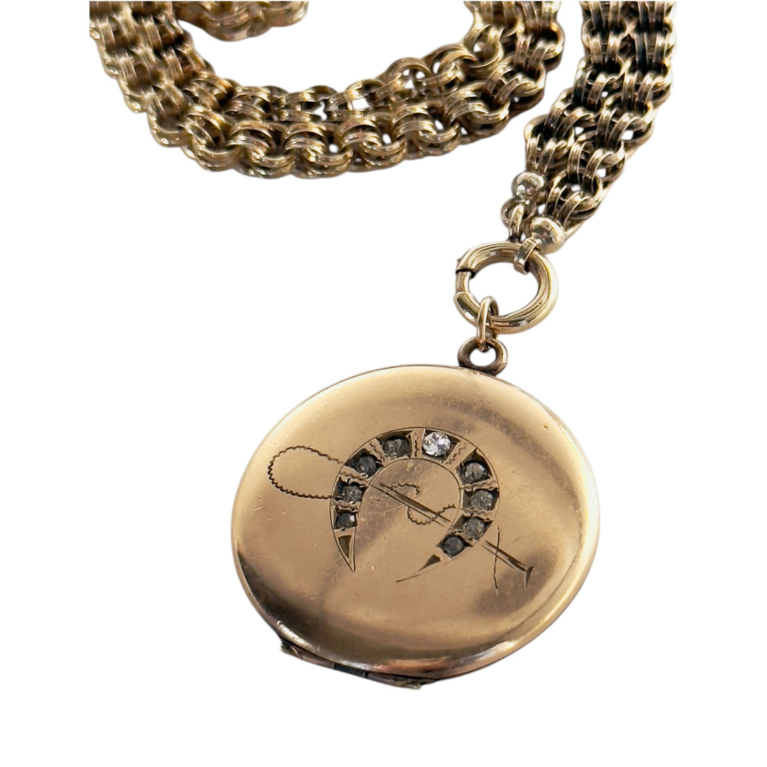 Gold-filled locket with horseshoe motif and plain reverse side