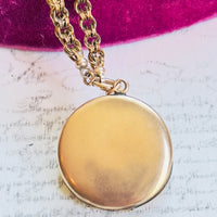 Round Gold Locket on Gold Watch Chain