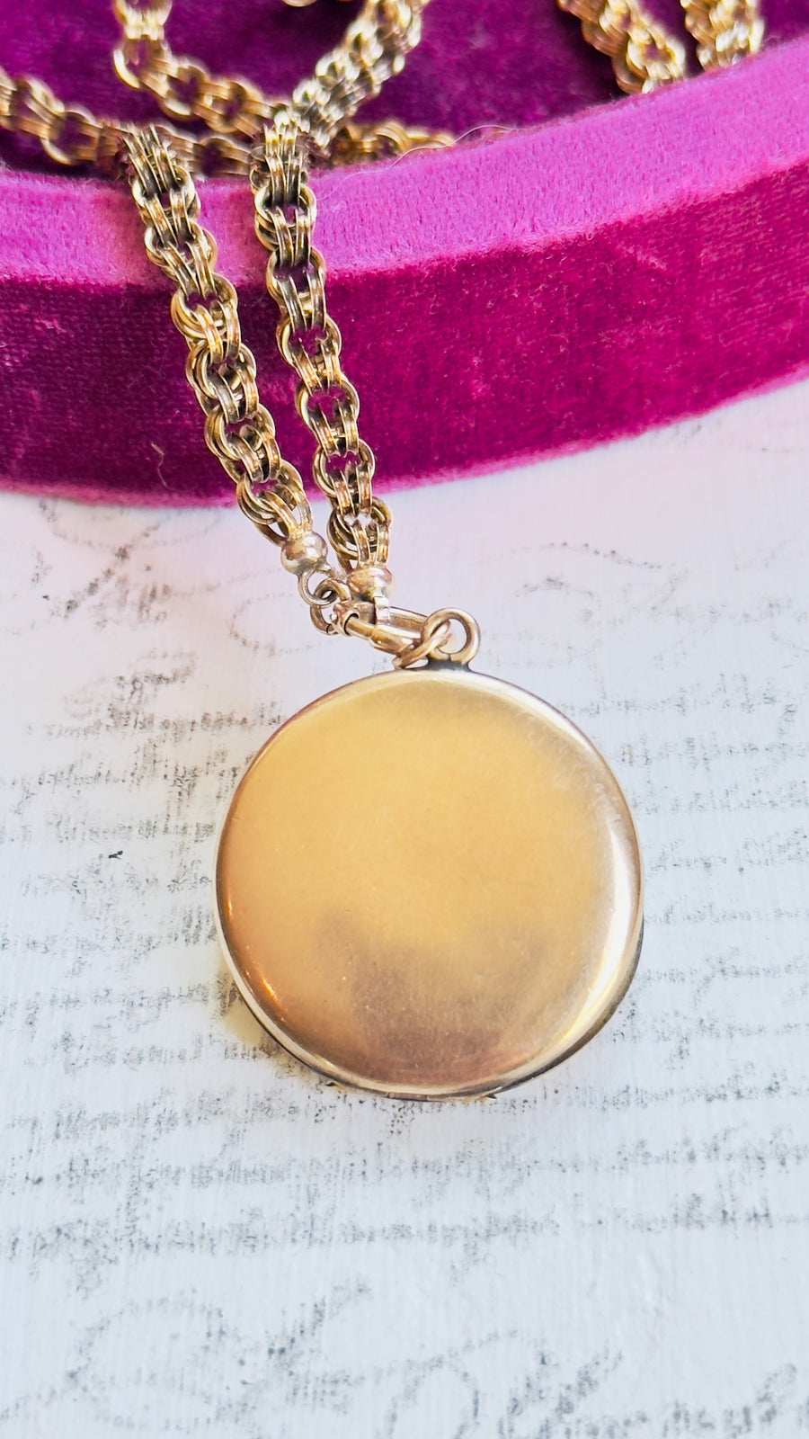 Round Gold Locket on Gold Watch Chain