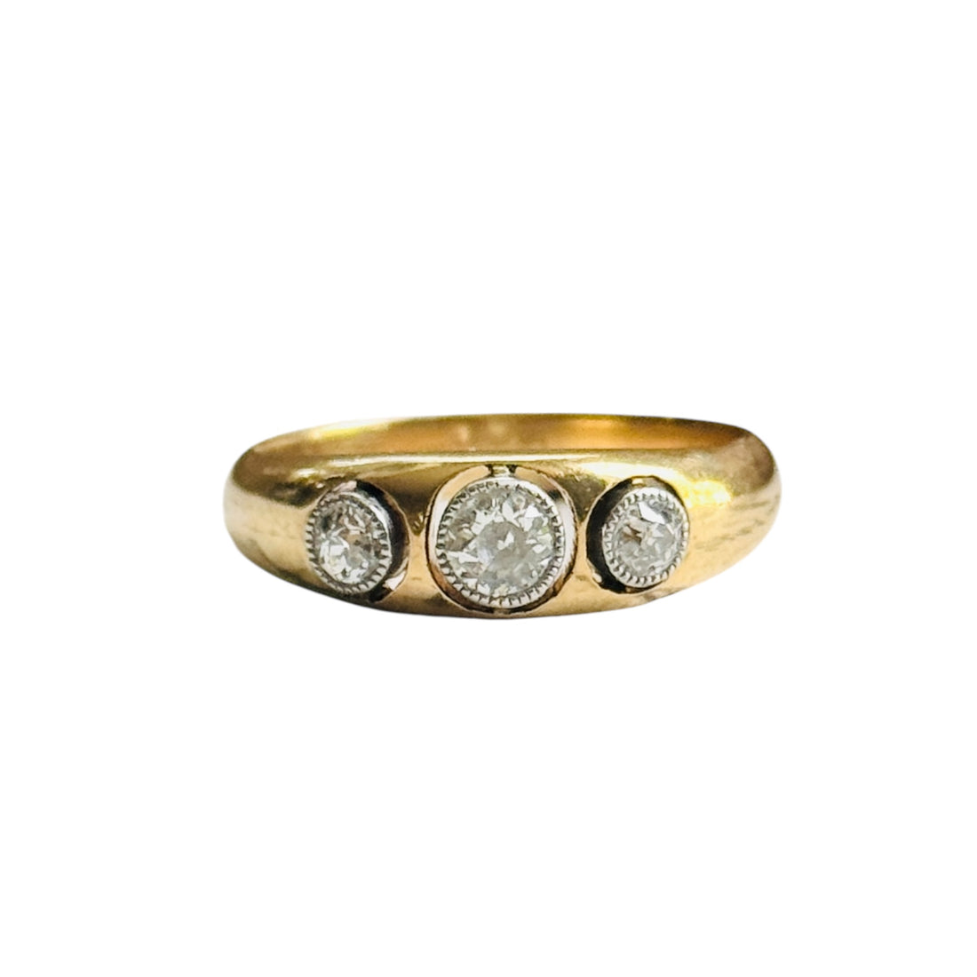 Antique Art Deco 18K gold ring with three old mine-cut diamonds set low in a domed band, circa 1920