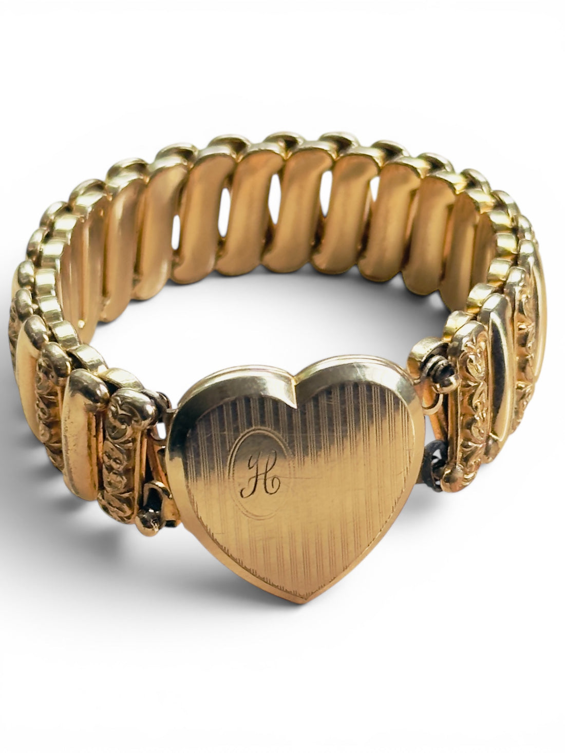 Antique gold-filled locket bracelet signed LACO with brushed heart face and script monogram, wearable estate keepsake