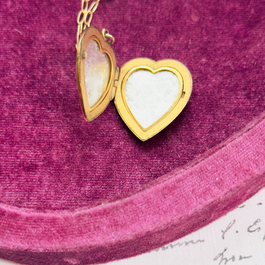 Open locket showing photo frames inside