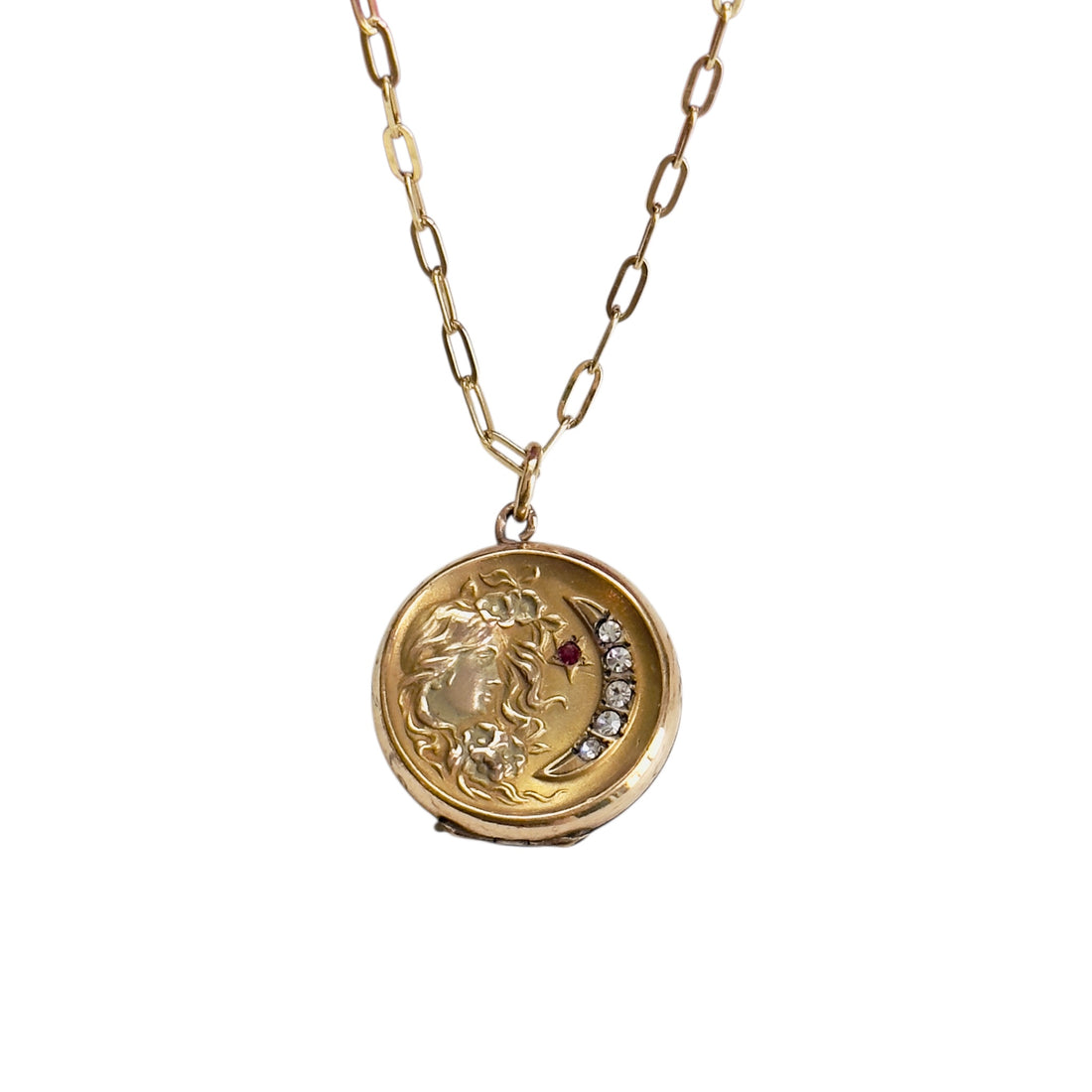 Gold-filled crescent moon locket with Art Nouveau female profile
