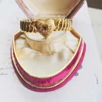 Bigney mid-century sweetheart expansion bracelet, gold filled Florentine finish with hand-engraved floral scrollwork and heart motif