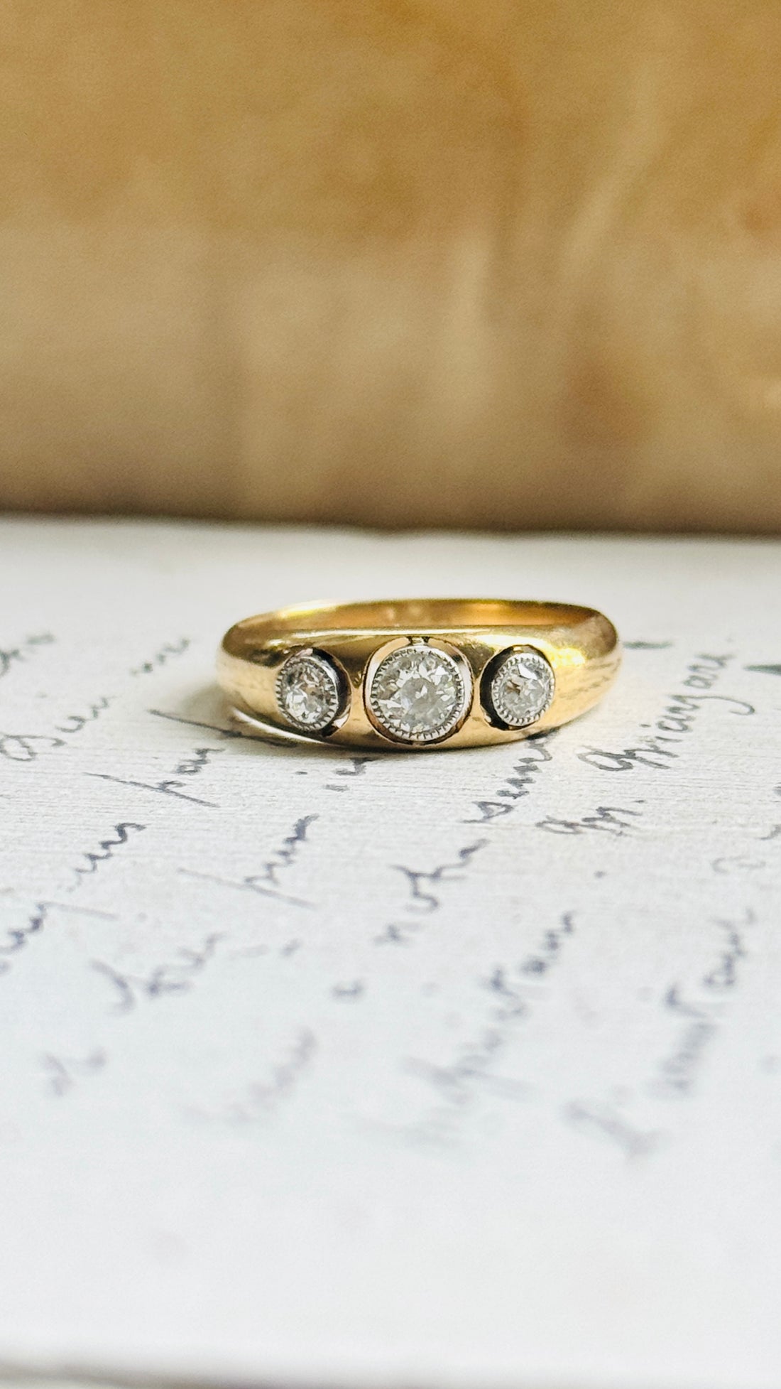 Circa 1920 French diamond ring in 18K gold and platinum, side profile showing the domed band shape