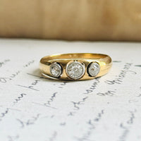 Circa 1920 French diamond ring in 18K gold and platinum, side profile showing the domed band shape
