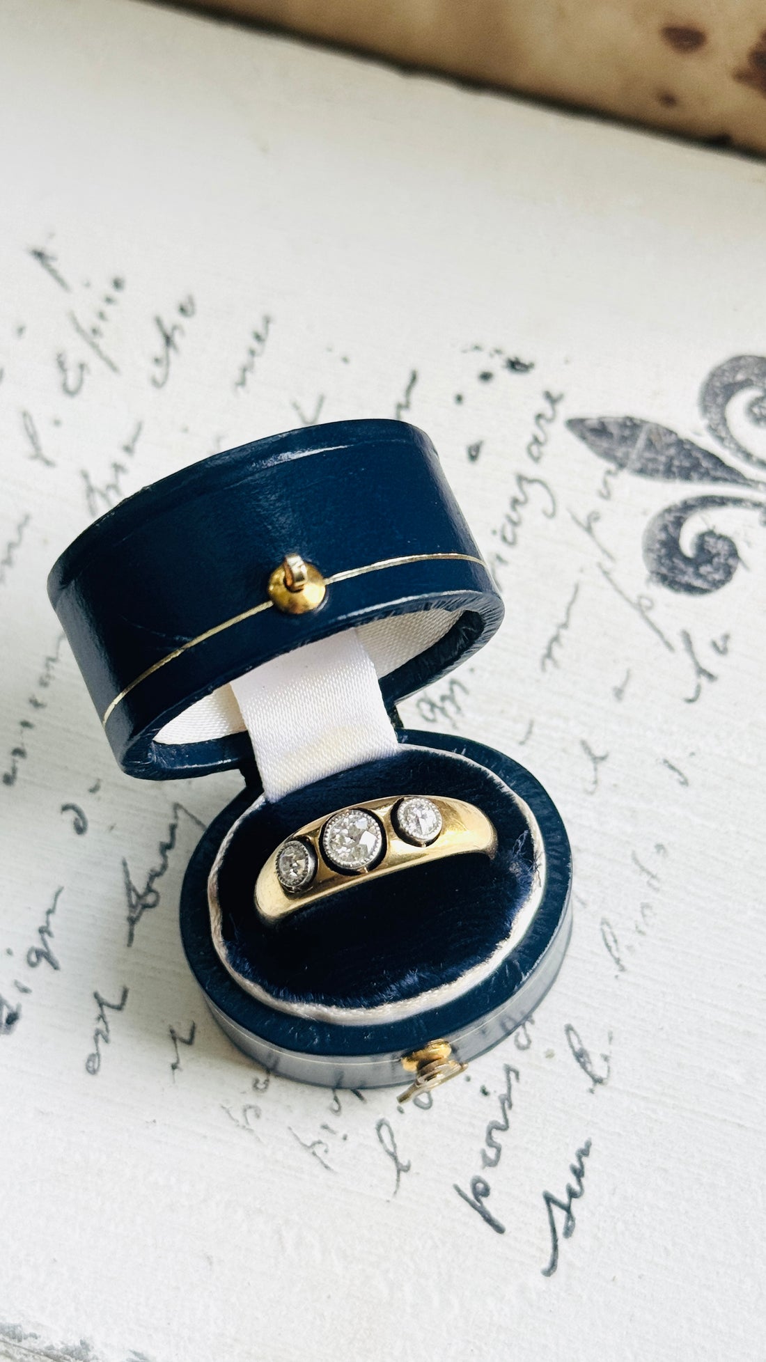 Circa 1920 diamond ring displayed in a vintage-style ring box